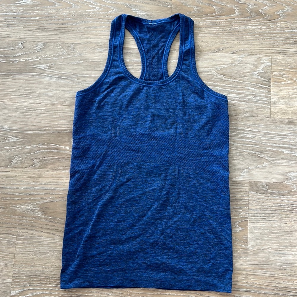 Lululemon swiftly tech racerback tank. Size 6. Deep blue color.
